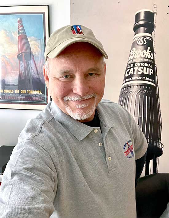 Portrait of Engraphix Sign Designer and Owner of worlds largest catsup bottle water tower