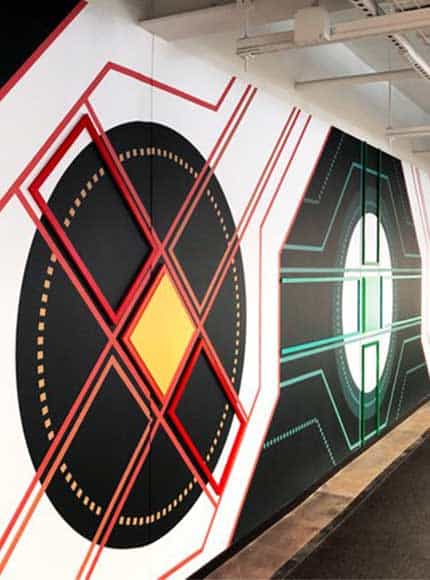 Vinyl graphics shape wall with dimensional elements