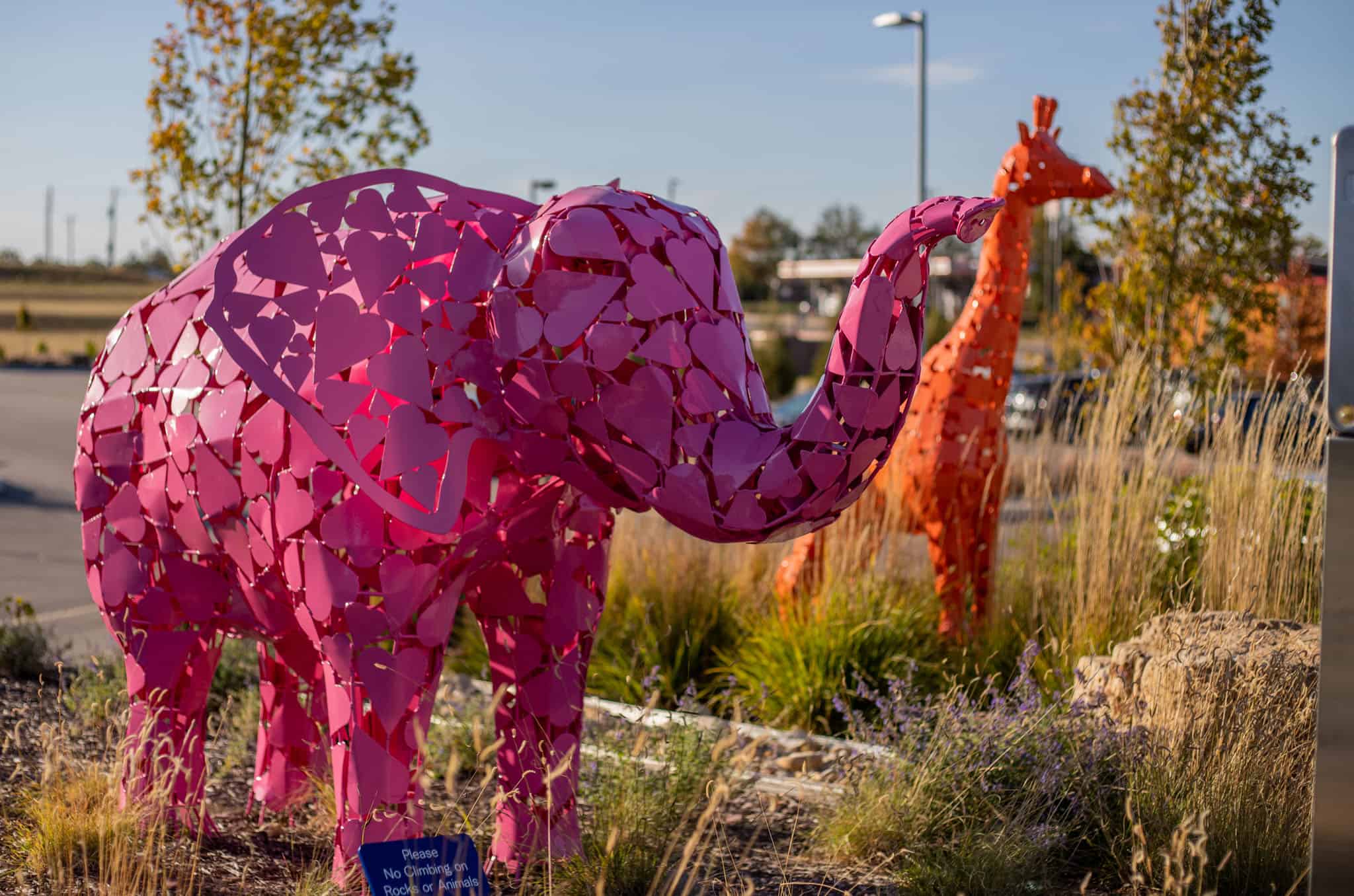 elephant and giraffe custom sculptures for childrens car center