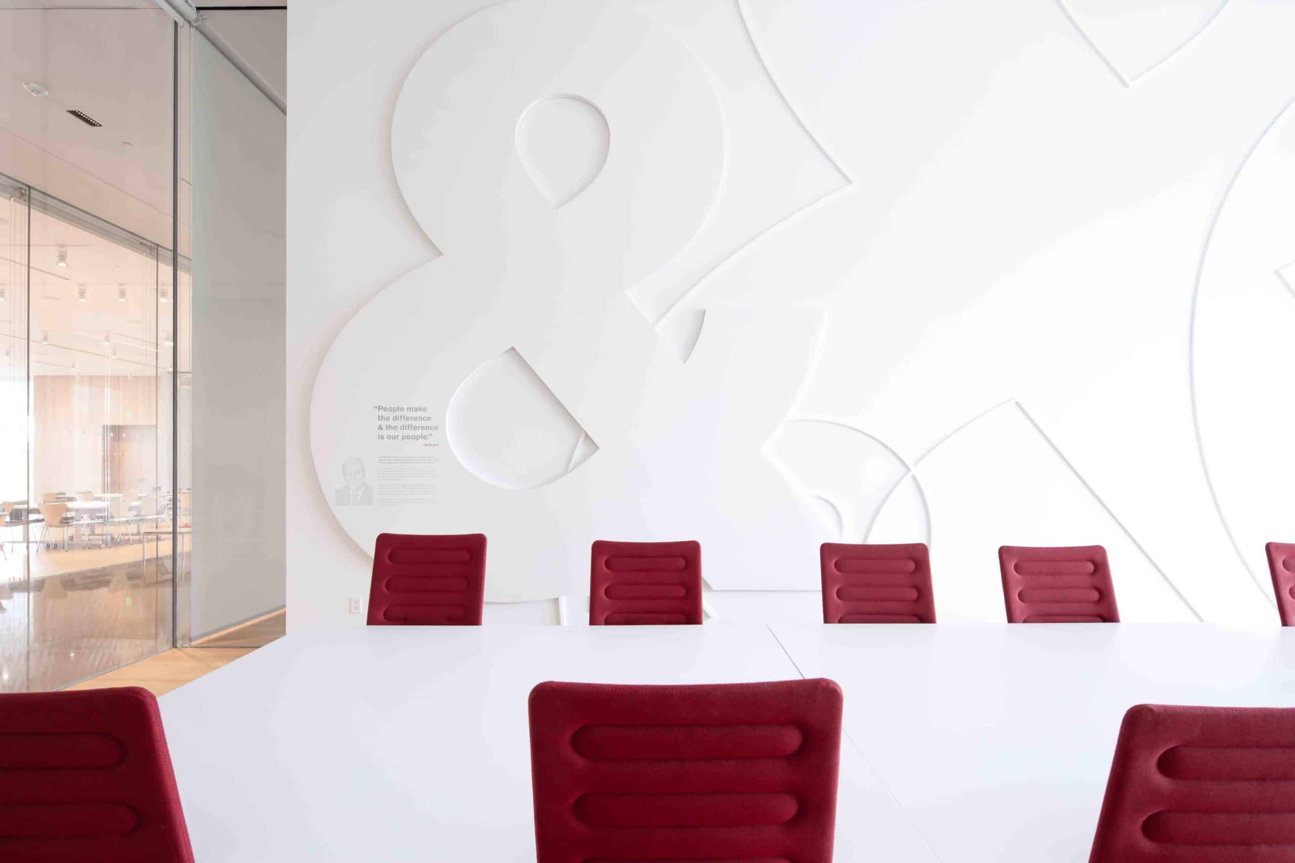 White dimensional ampersand sign for Kum & Go meeting room