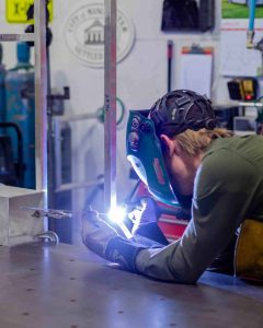 Engraphix Fabrication team welding together sculpture frame