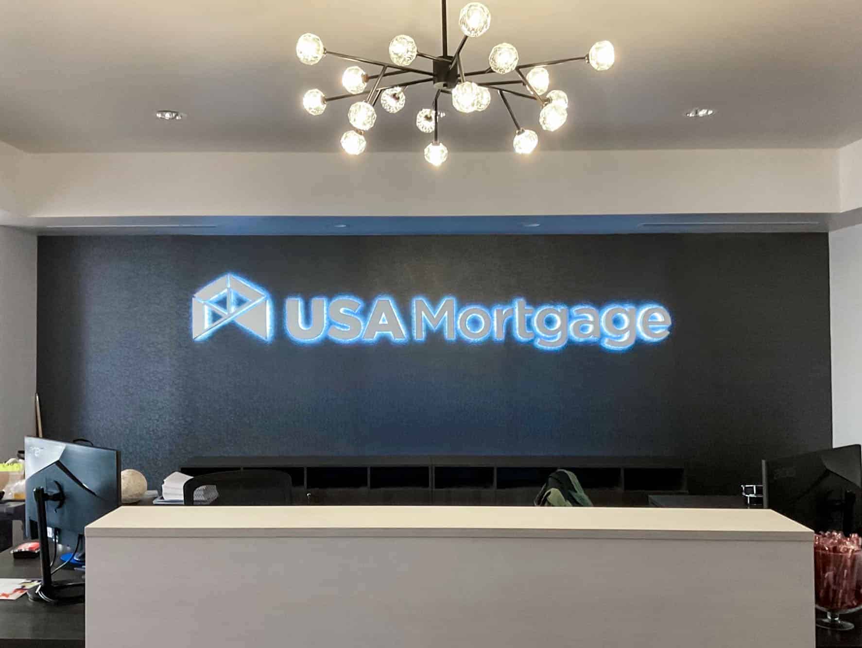 USA Mortgage lobby with illuminated lobby sign