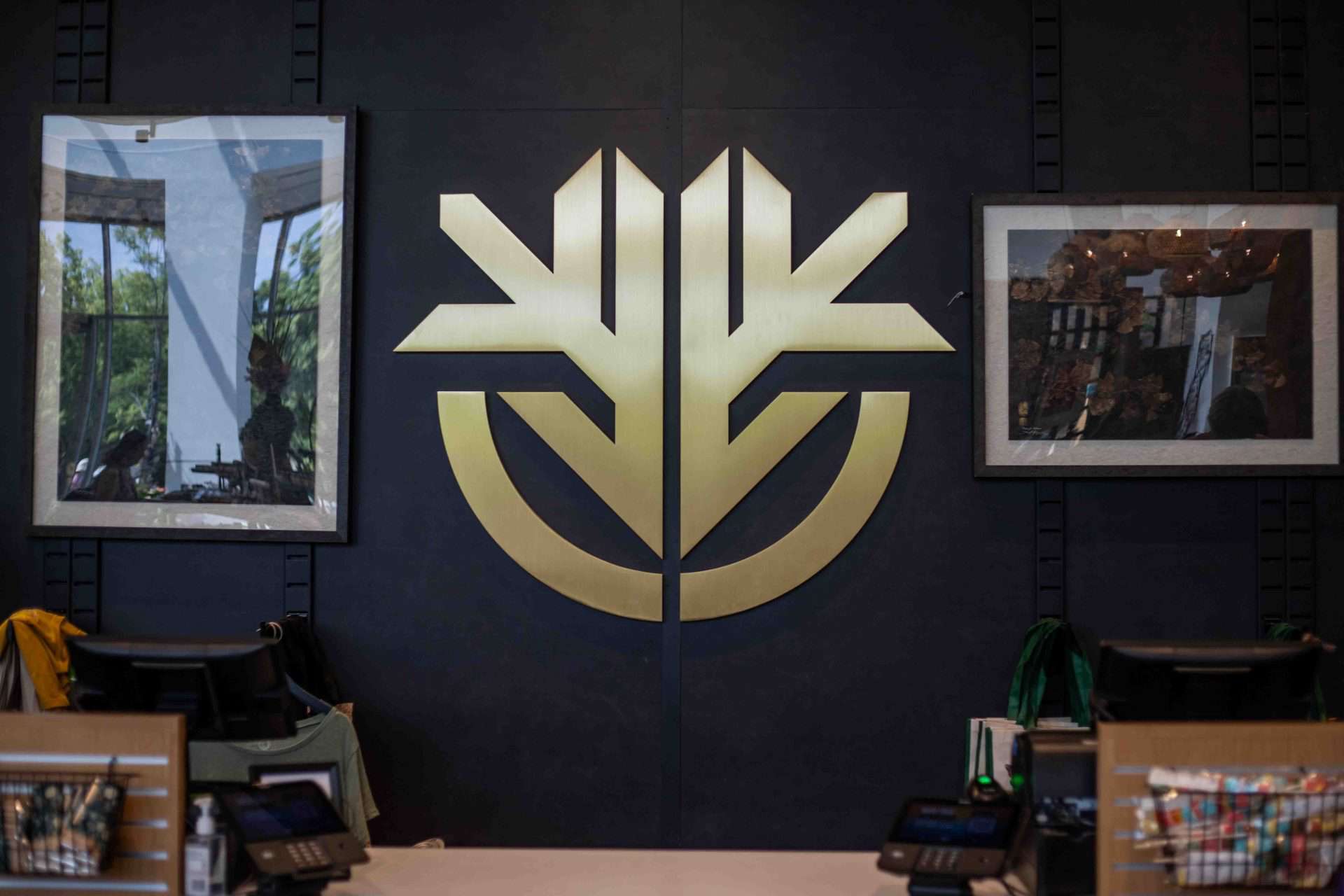 sleek gold logo wall for garden shop at Missouri Botanical Garden