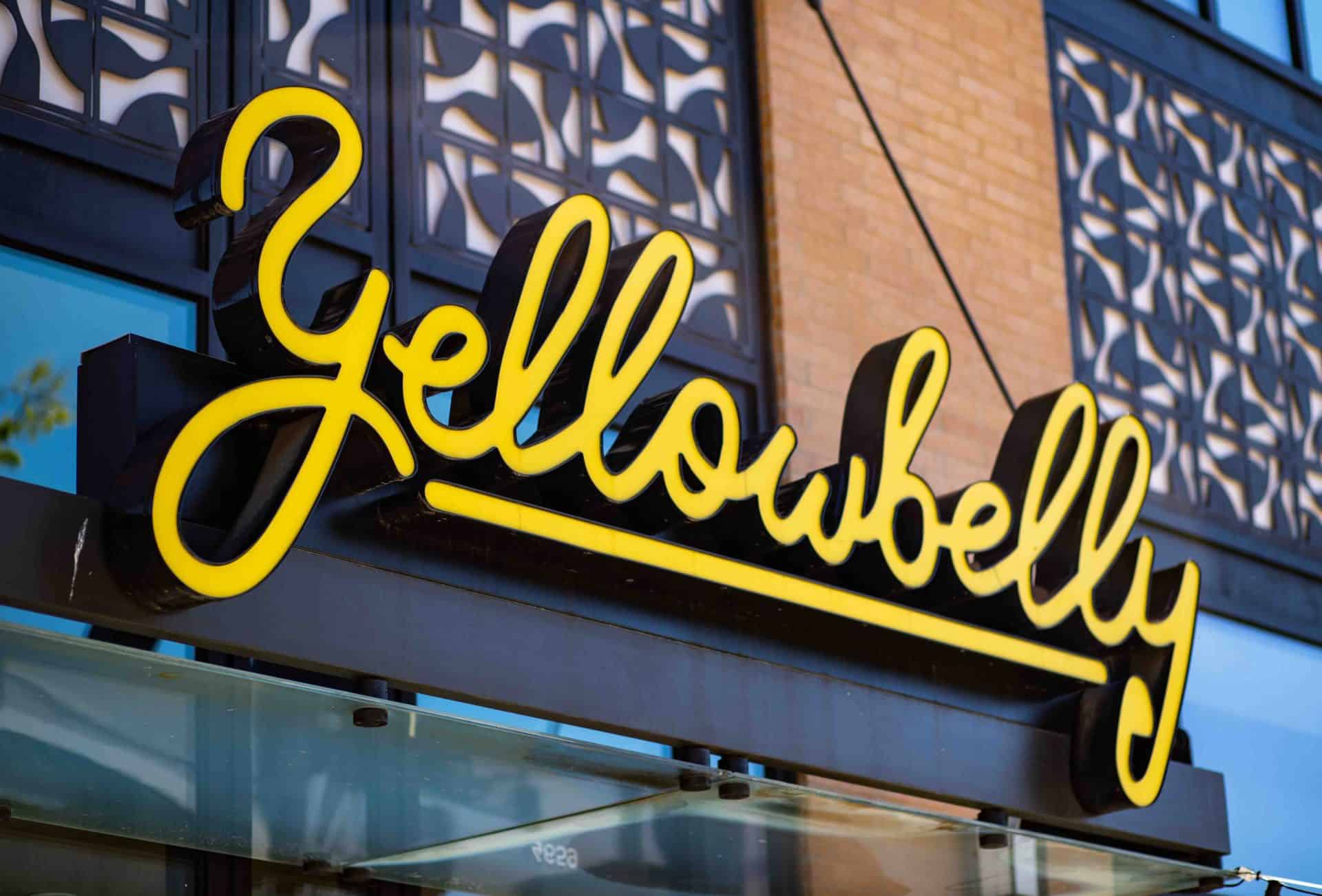 detail shot of branded illuminating channel letters standing on rooftop at Yellowbelly restaurant