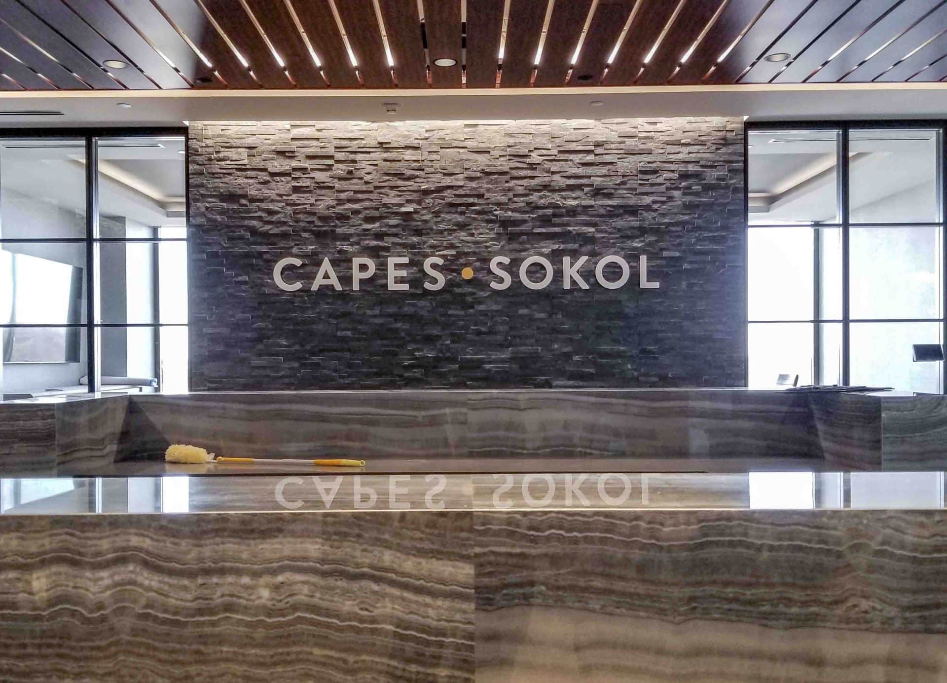 Capes Sokol dimensional letterset for custom logo wall installed on rock wall