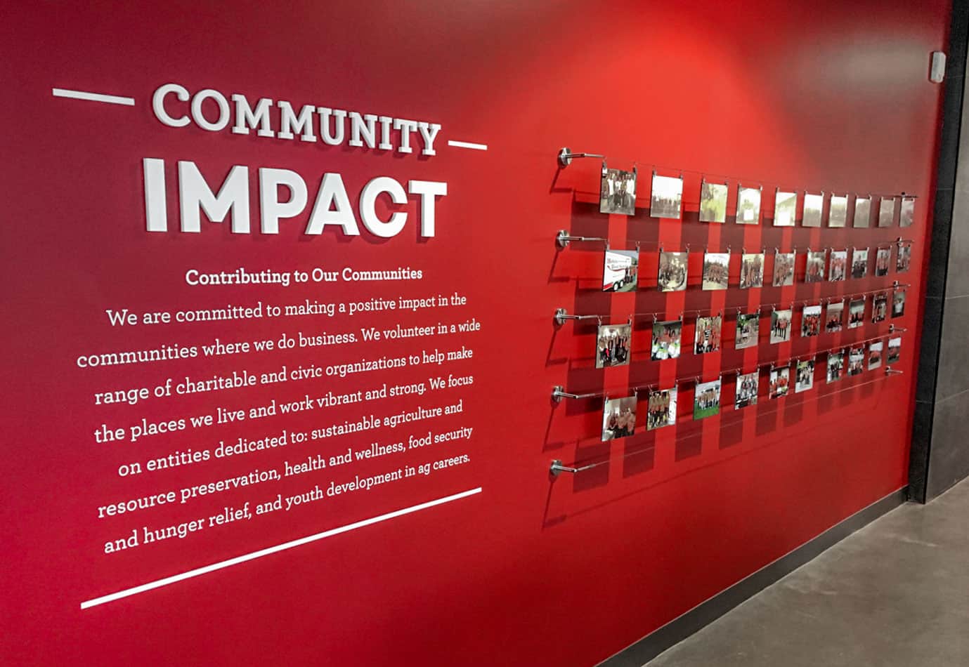 Community Impact dimensional accent wall fabricated by Engraphix