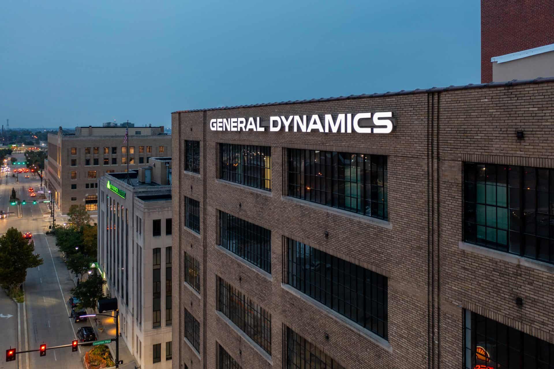 Illuminating building sign for General Dynamics Illuminates white