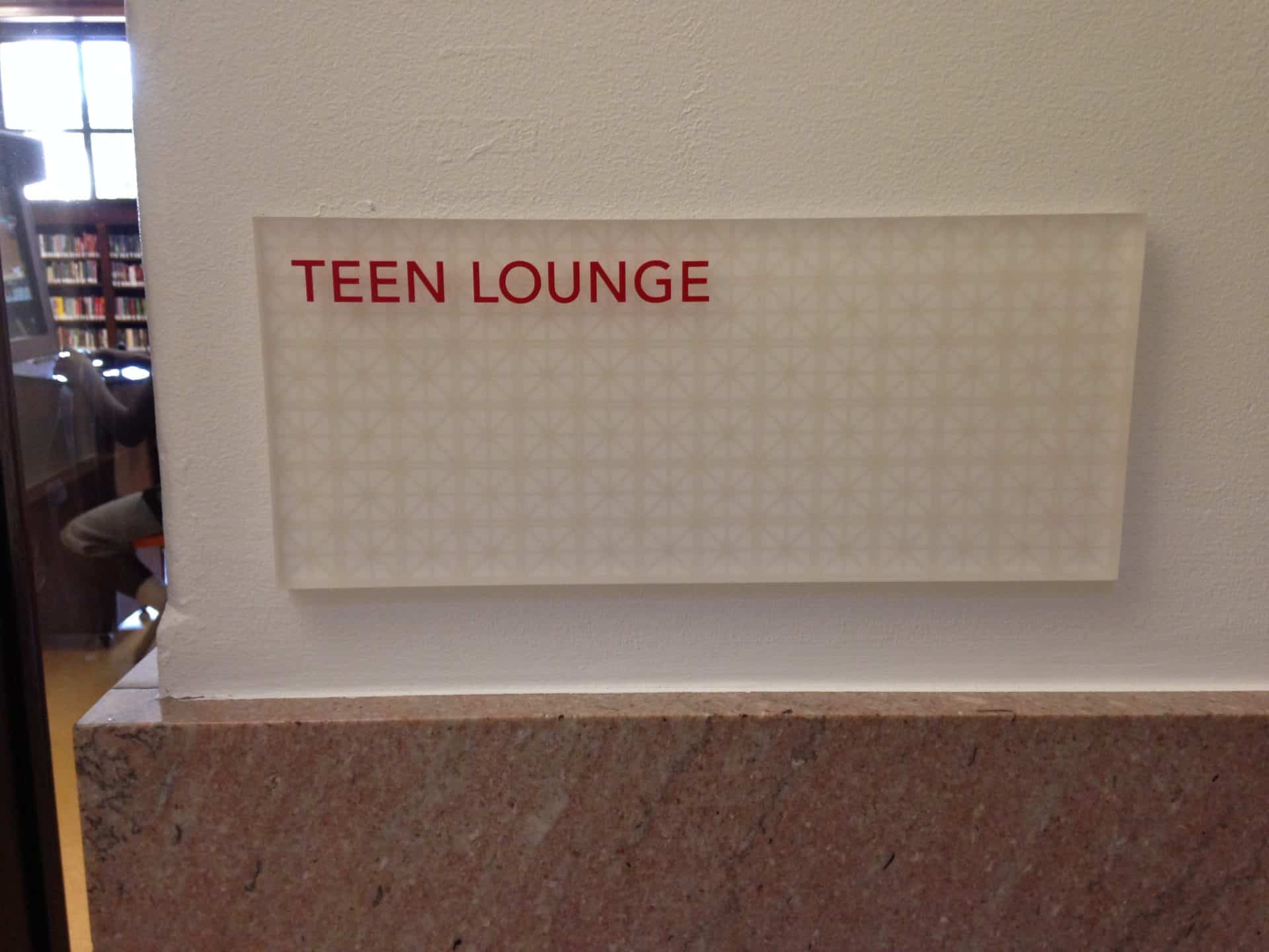 Teen Lounge Door Sign clear with vinyl pattern