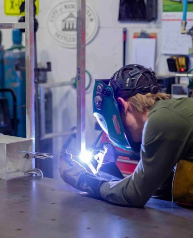 Engraphix Fabrication team welding together sculpture frame